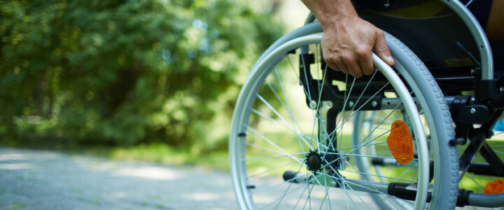 closeup of person in wheelchair